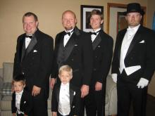 The groomsmen and ringbearers.